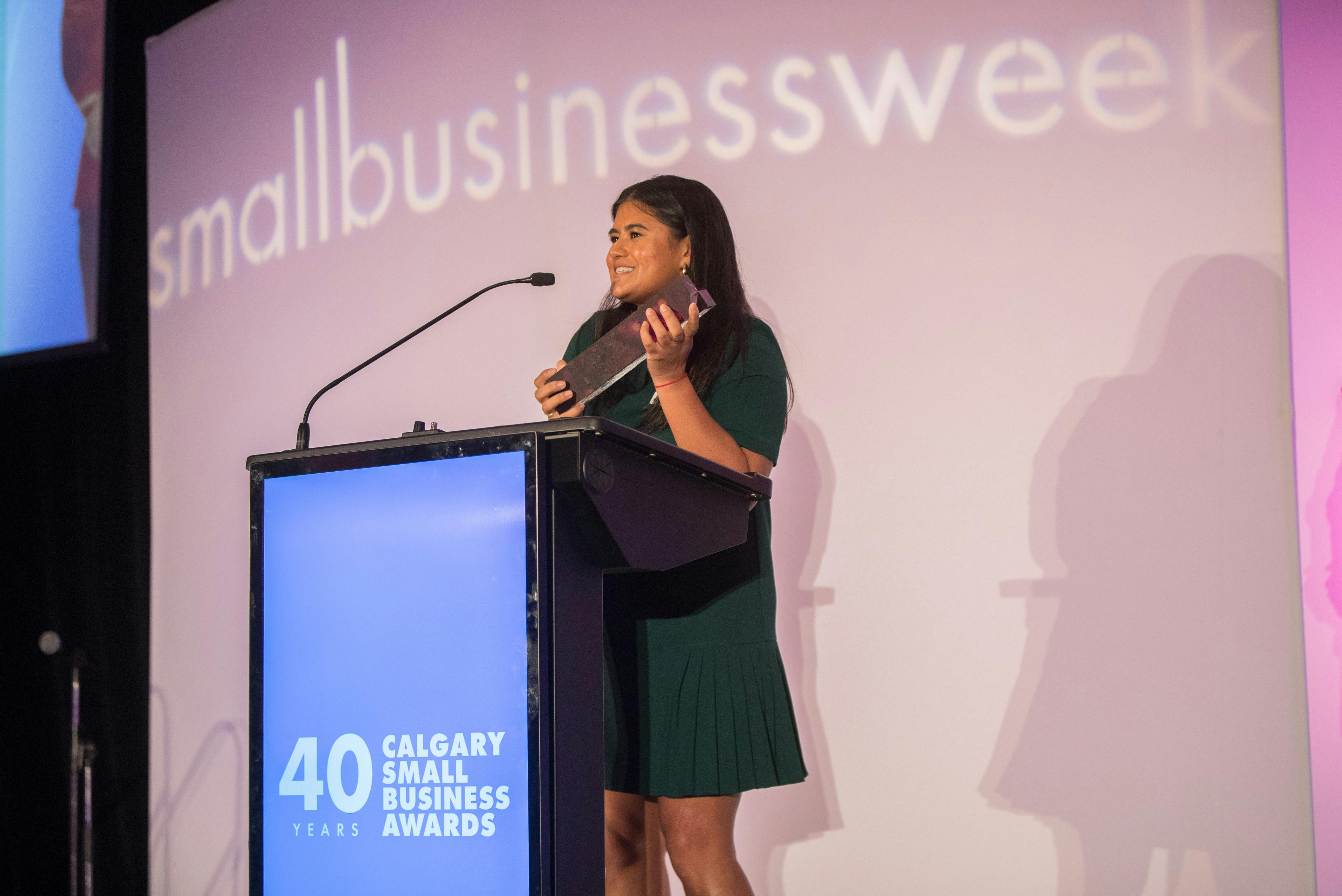 Tsering Asha Leba accepts award on behalf of RedPoint Media.